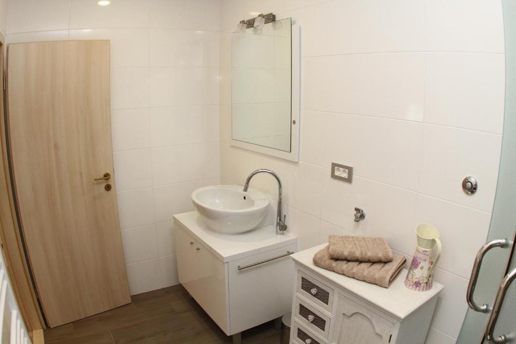 Koupelna v ubytování Studio Apartments Mirakul