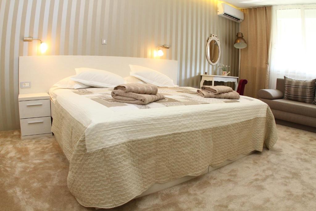 Postel nebo postele na pokoji v ubytování Studio Apartments Mirakul