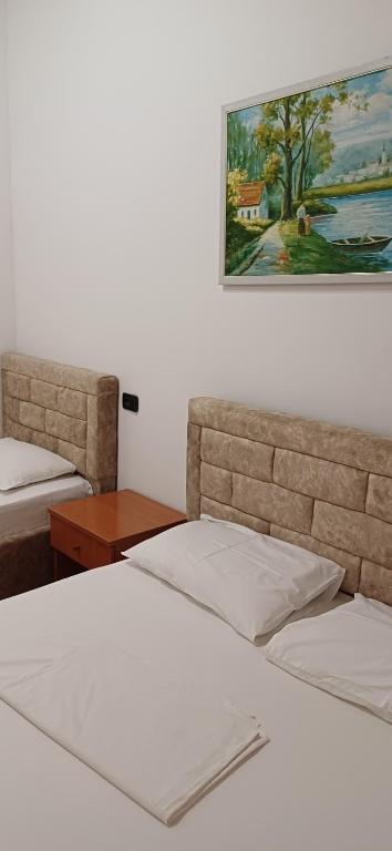 Postel nebo postele na pokoji v ubytování Hotel Lepenica