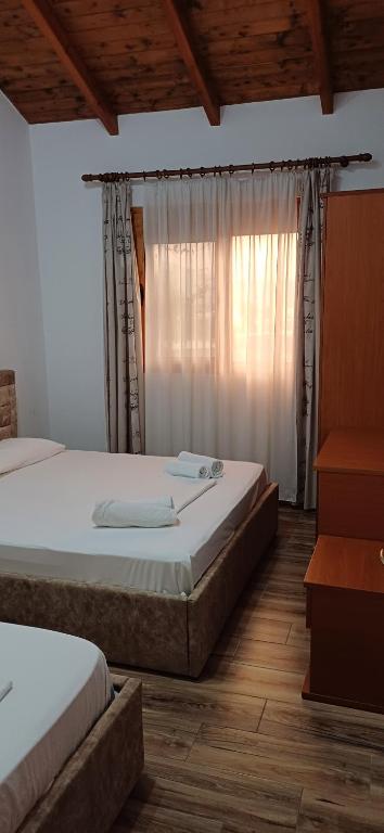 Postel nebo postele na pokoji v ubytování Hotel Lepenica