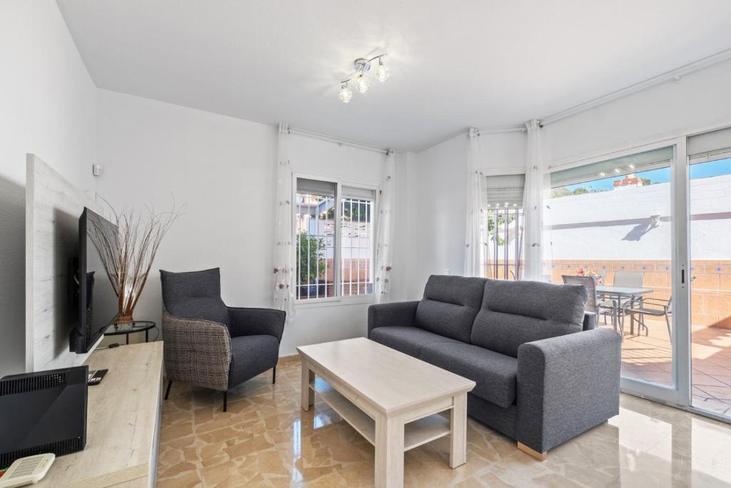 TV a/nebo společenská místnost v ubytování Villa Montelimar - Biznaga Rental Homes