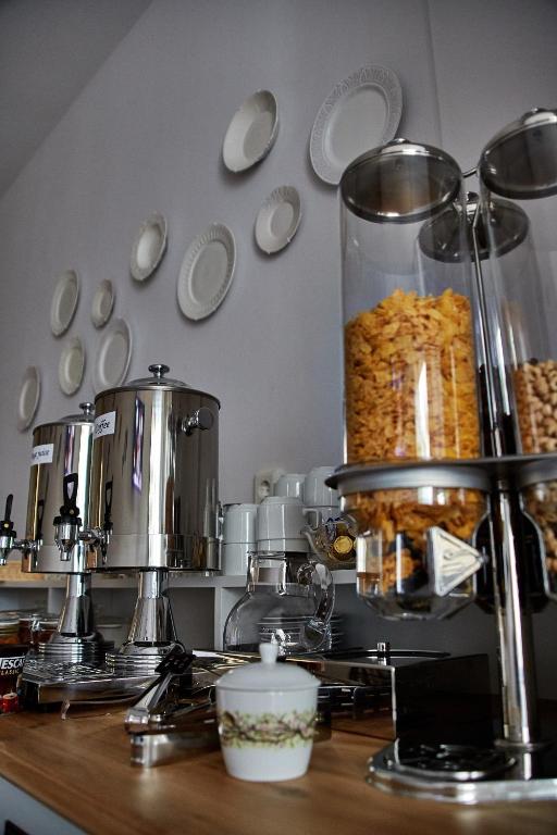 a kitchen with a counter with food in a blender at Irene Studios in Agios Petros