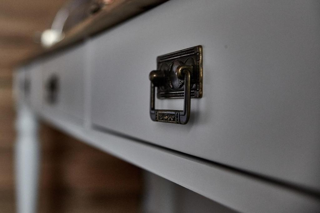a close up of a drawer with a latch at Irene Studios in Agios Petros