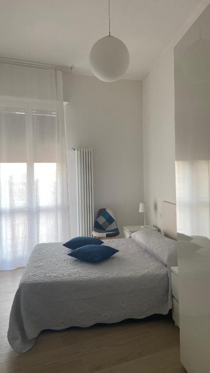 Posteľ alebo postele v izbe v ubytovaní Casa L&R