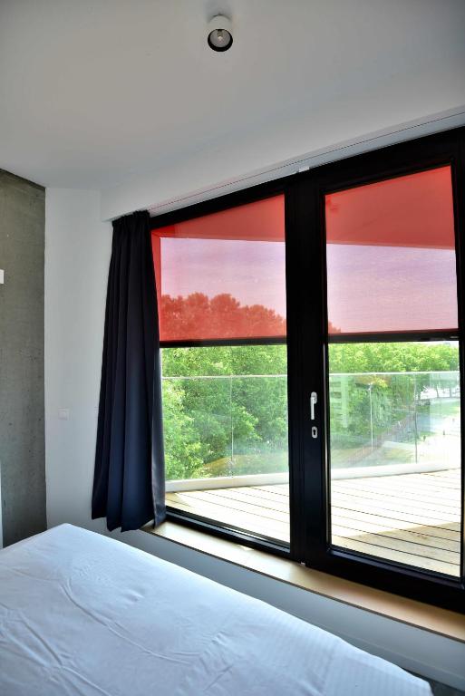 Letto o letti in una camera di Hôtel Belvue