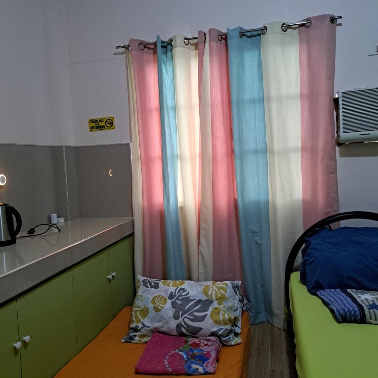 Postel nebo postele na pokoji v ubytování JZA Transient House