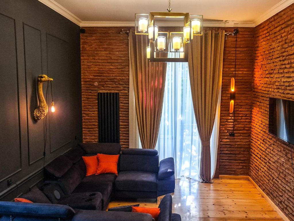 Гостиная зона в Top Floor Apartment+Balcony in sololaki / Room 25