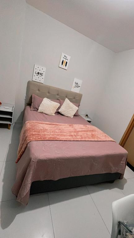 Postel nebo postele na pokoji v ubytování Lençóis Confort Residence