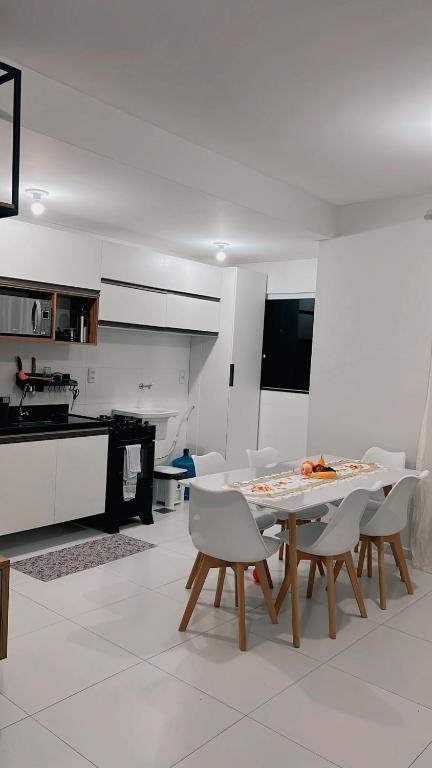 Kuchyň nebo kuchyňský kout v ubytování Lençóis Confort Residence
