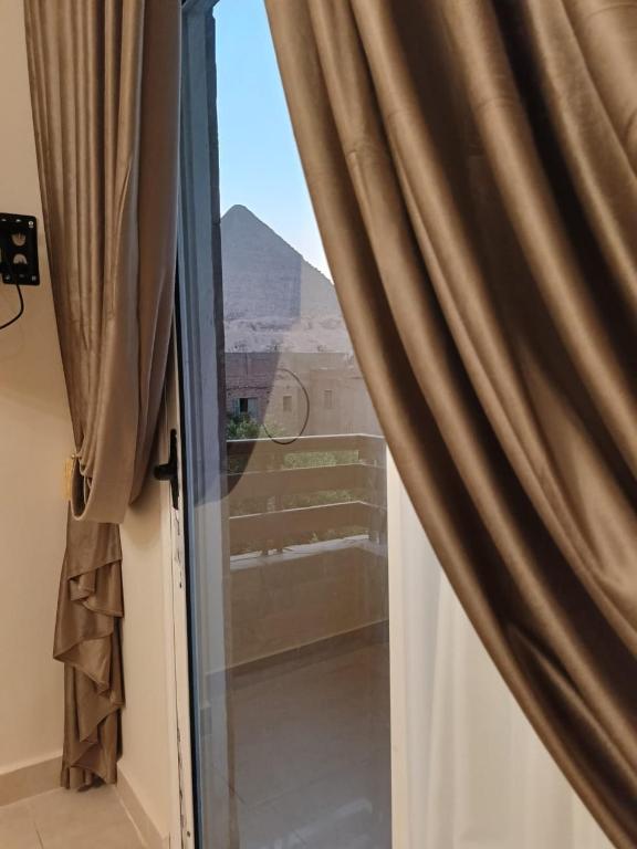 Nespecifikovaný výhled na hory nebo výhled na hory při pohledu z hotelu