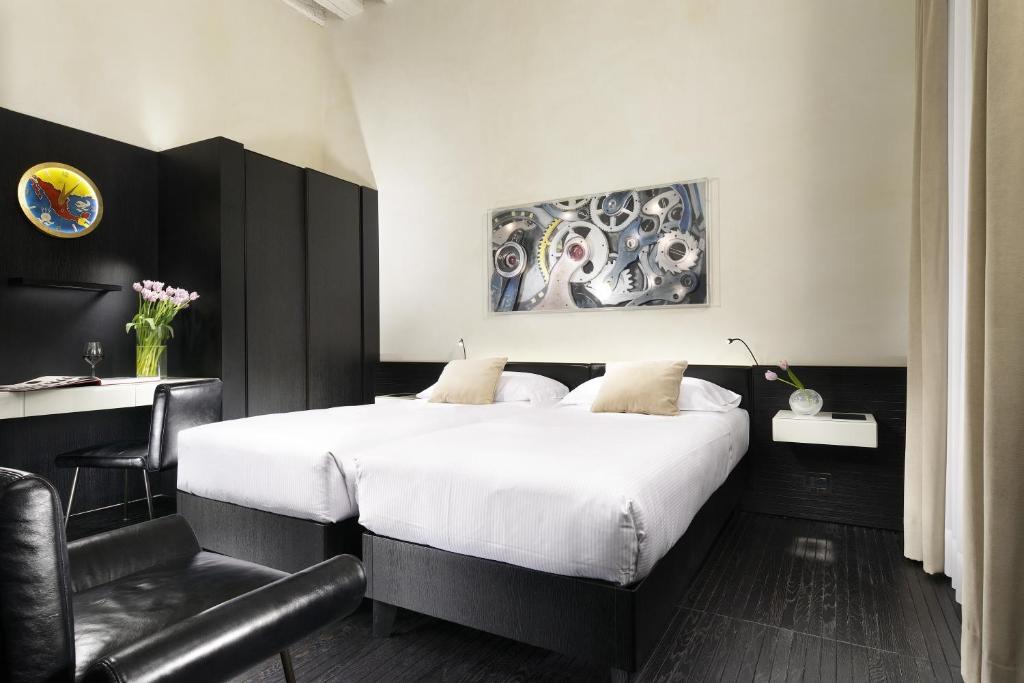 Postel nebo postele na pokoji v ubytování Hotel L'Orologio Venezia - WTB Hotels