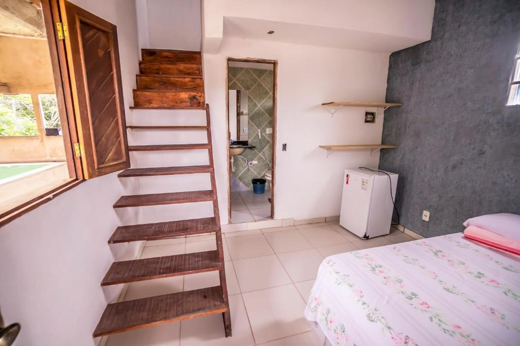 Postel nebo postele na pokoji v ubytování Pousada Luz da Vila Itaúnas