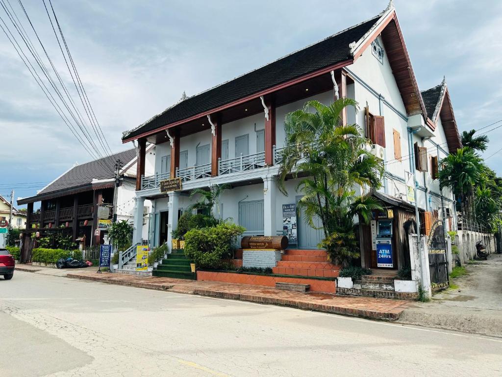 a building on the side of a street at Visoun Luang Prabang Hotel in Luang Prabang