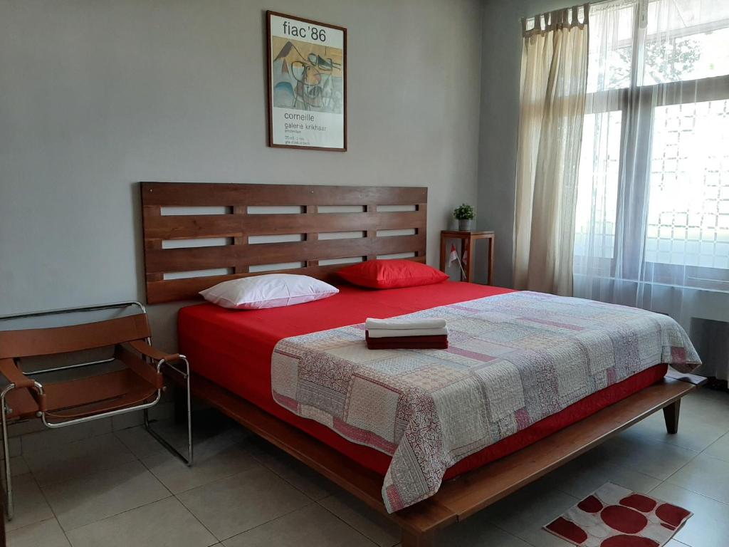 Postel nebo postele na pokoji v ubytování rumah566