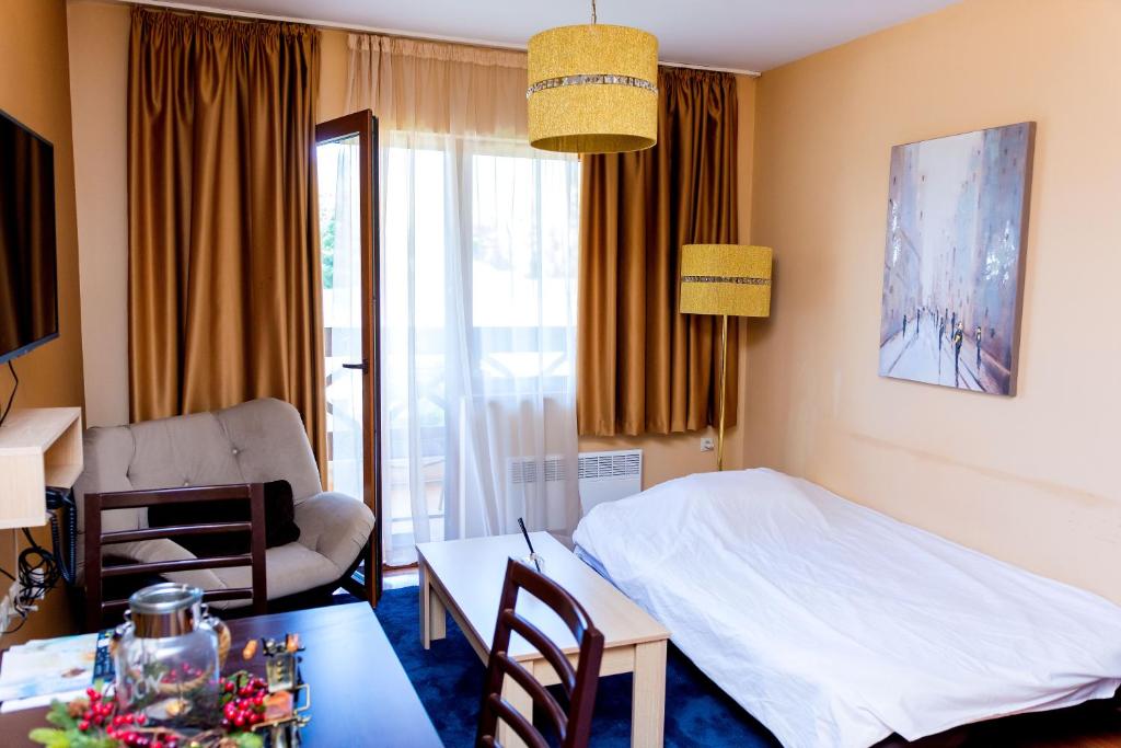 Postel nebo postele na pokoji v ubytování private apartment Bansko