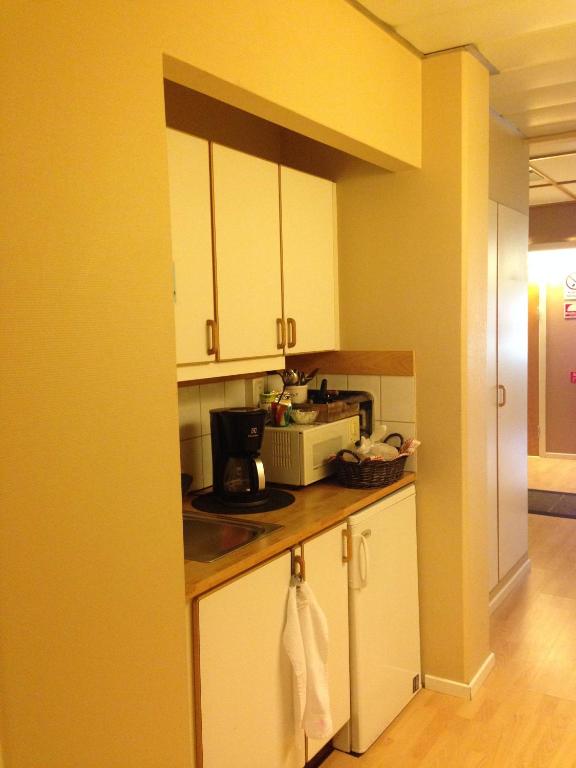 Kuchyň nebo kuchyňský kout v ubytování Kils Hotell & Restaurang