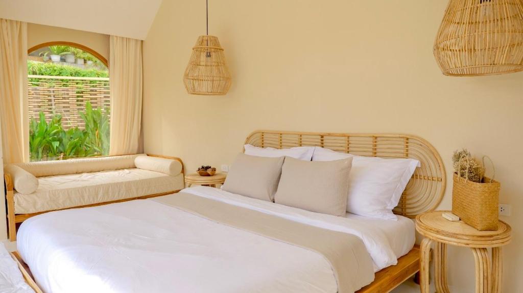 Postel nebo postele na pokoji v ubytování Hideout Koh Kood