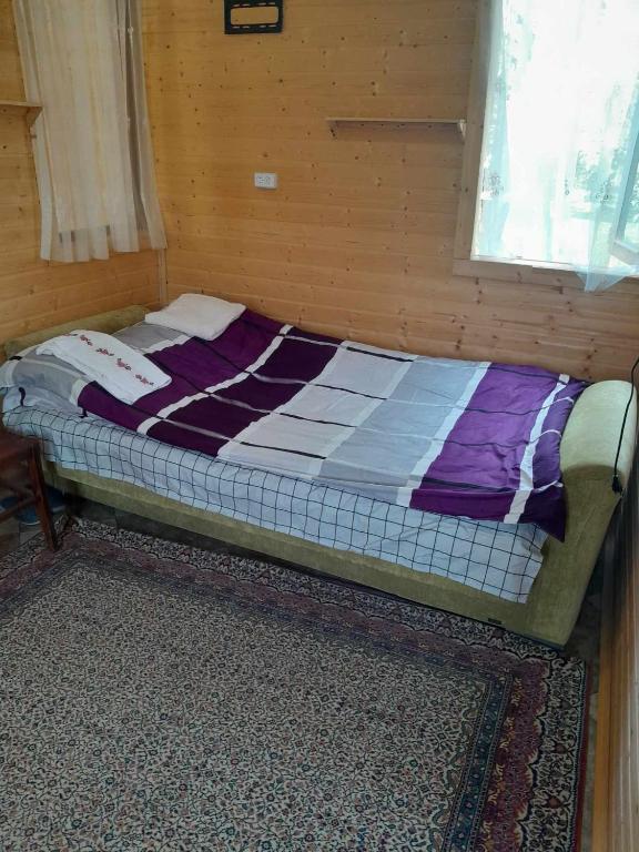 Postel nebo postele na pokoji v ubytování Riverside