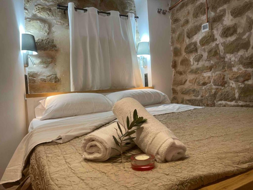 Postel nebo postele na pokoji v ubytování Castell de l'Aguda
