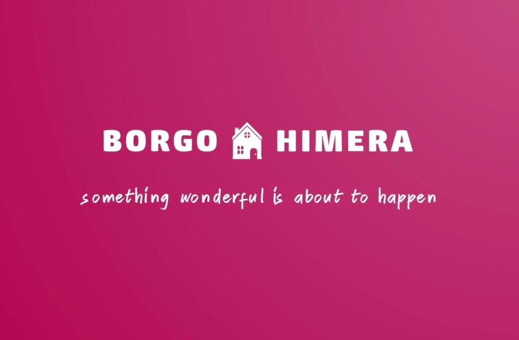 テルミニ・イメレーゼにあるBorgo Himera - GREAT SPOT between Cefalù & Palermoのピンクの看板