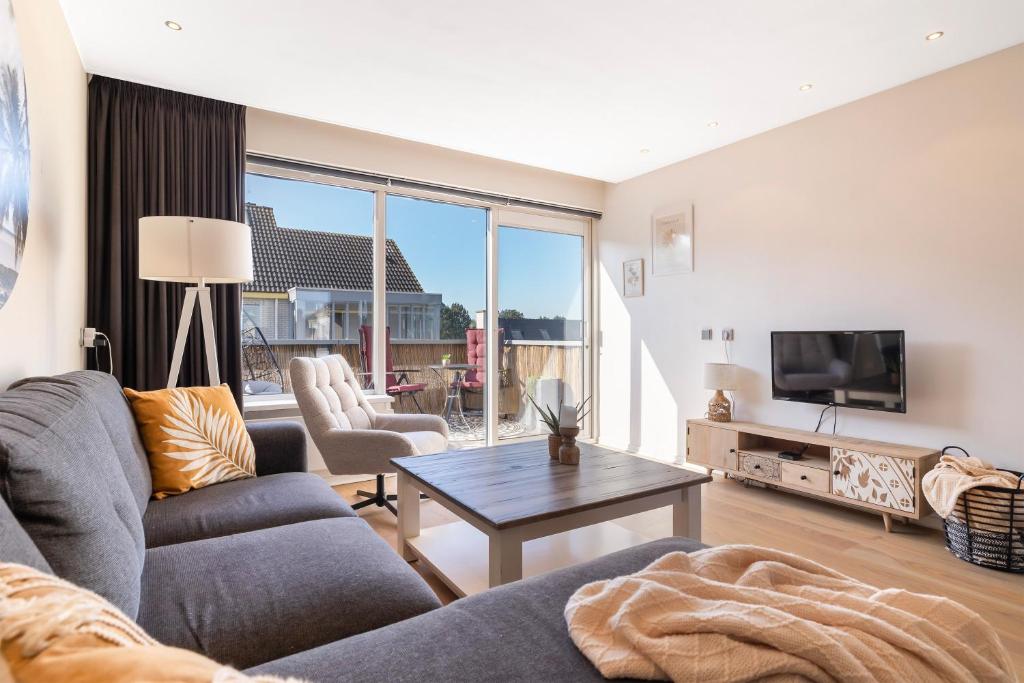 TV a/nebo společenská místnost v ubytování Luxury Apartment near Utrecht & Amsterdam