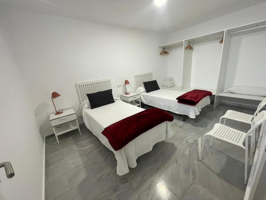 Posteľ alebo postele v izbe v ubytovaní Casa adosada Artola Marbella - Piscina privada