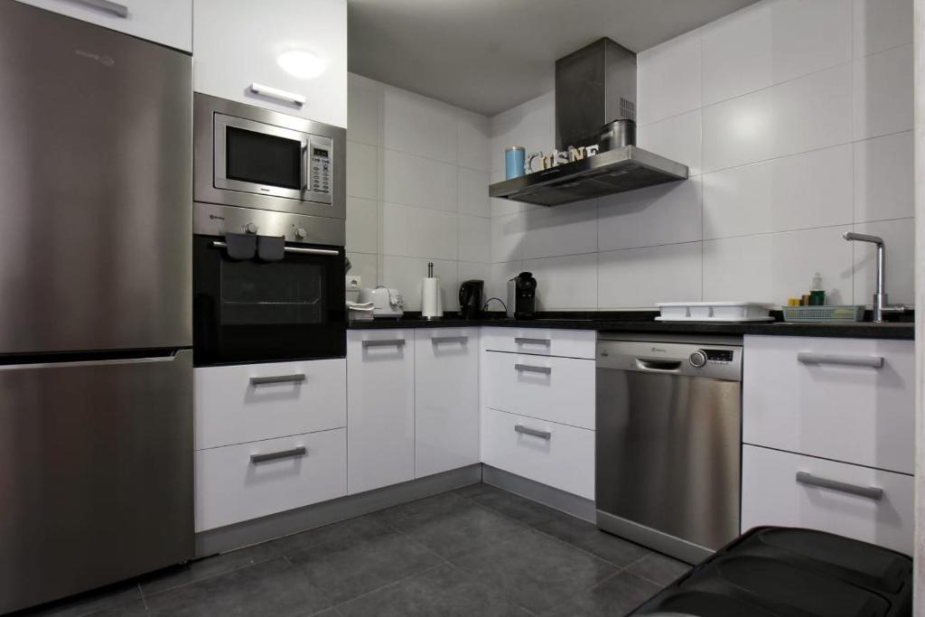 Kuchyň nebo kuchyňský kout v ubytování Apartamento Buruntzali