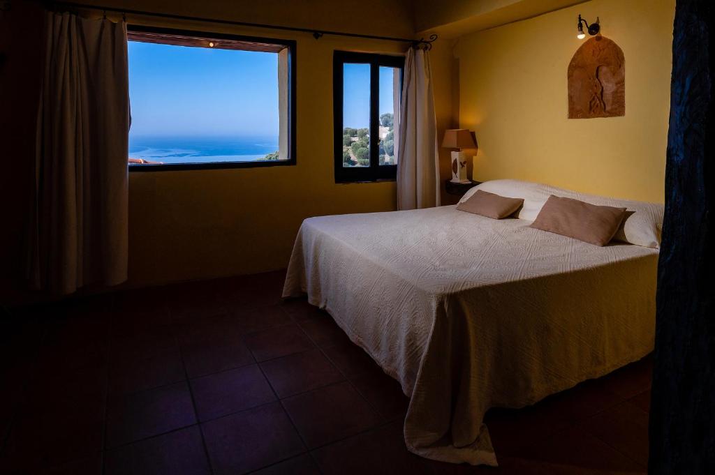 Postel nebo postele na pokoji v ubytování Marulivo Hotel