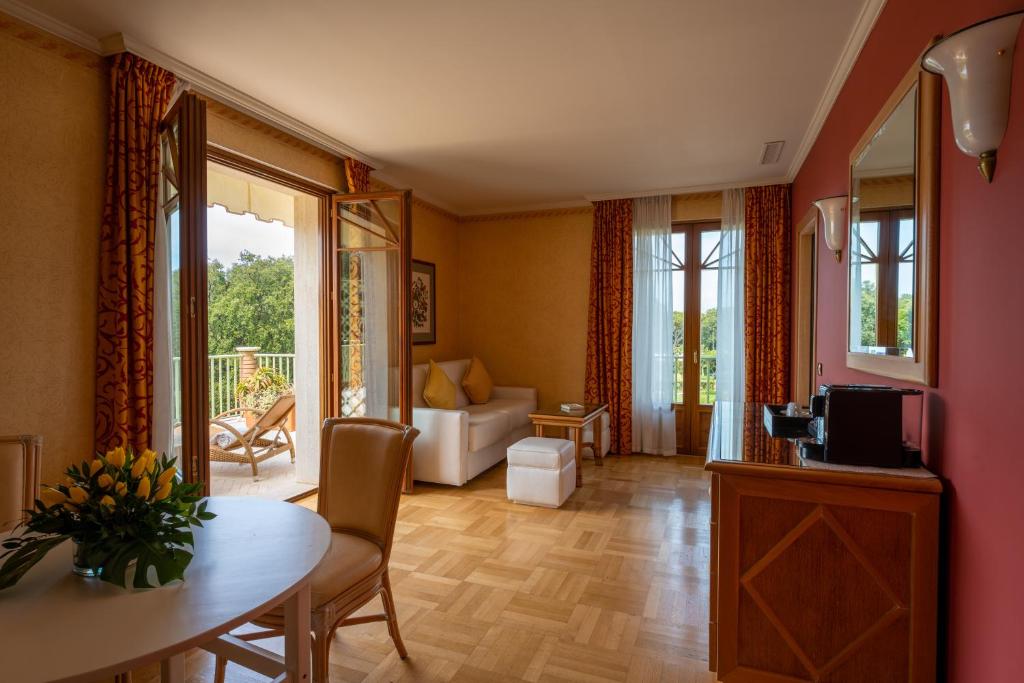 Postel nebo postele na pokoji v ubytování Park Hotel Villa Ariston