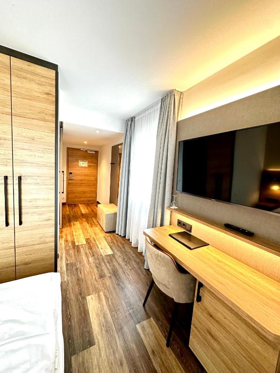 Postel nebo postele na pokoji v ubytování Hotel Seeblick