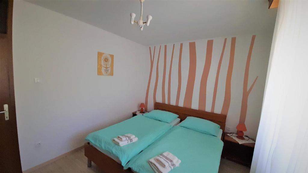 Postel nebo postele na pokoji v ubytování Guesthouse Sobe Silva