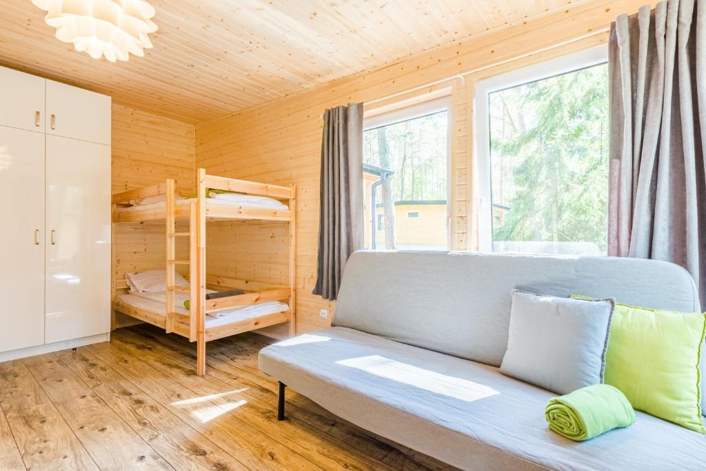 Postel nebo postele na pokoji v ubytování BURSZTYNOWO Ośrodek Wczasowy