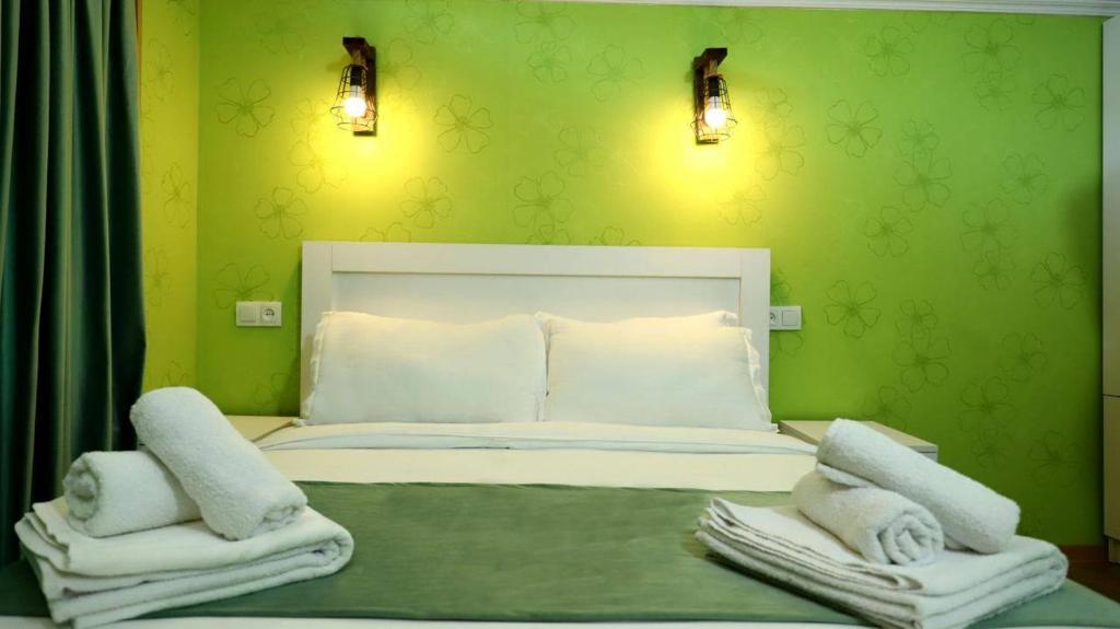 Postel nebo postele na pokoji v ubytování Star Villa Bakuriani