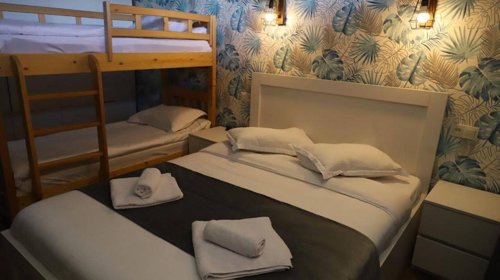 Postel nebo postele na pokoji v ubytování Star Villa Bakuriani