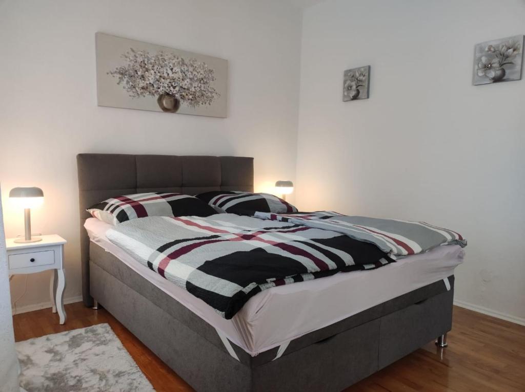 Postel nebo postele na pokoji v ubytování Ferienwohnung Gänseblümchen
