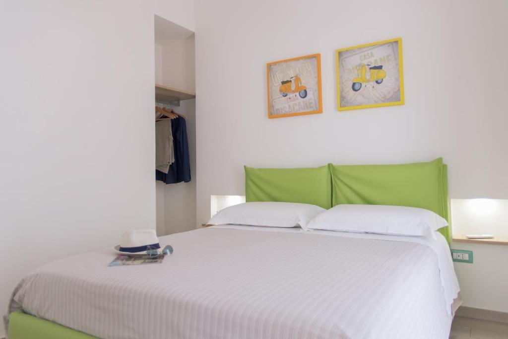 A bed or beds in a room at Casa Pisacane