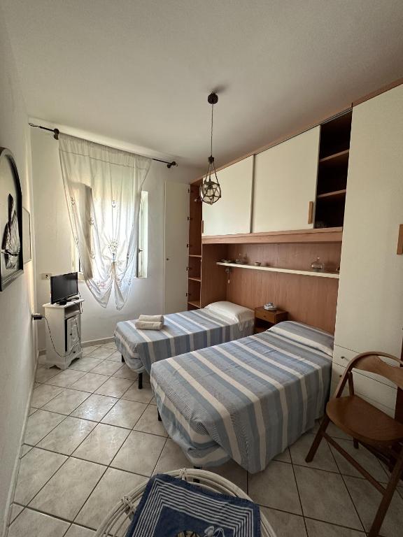 Postel nebo postele na pokoji v ubytování Casa Talento