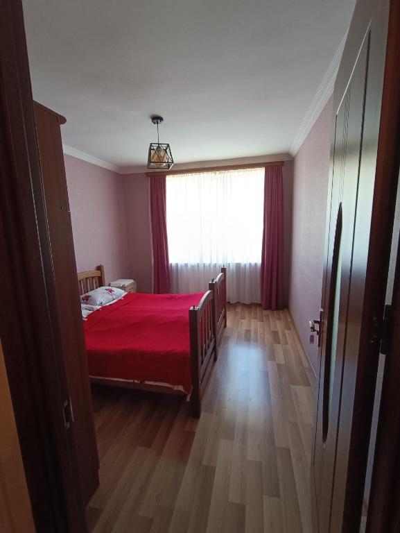 Ένα ή περισσότερα κρεβάτια σε δωμάτιο στο Kamara Guest House