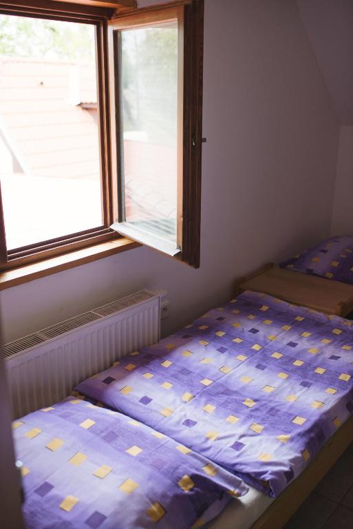 Postel nebo postele na pokoji v ubytování Penzion Nechorka