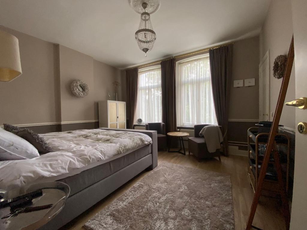 Postel nebo postele na pokoji v ubytování B&B Huis Spaas