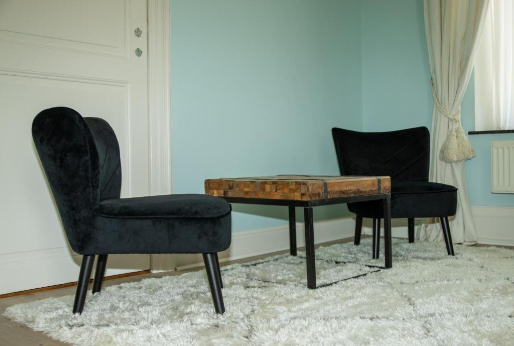 Posezení v ubytování B&B Huis Spaas