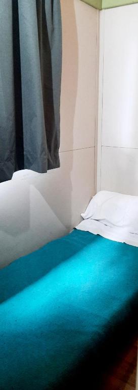 Łóżko lub łóżka w pokoju w obiekcie CAMPING RIANXO