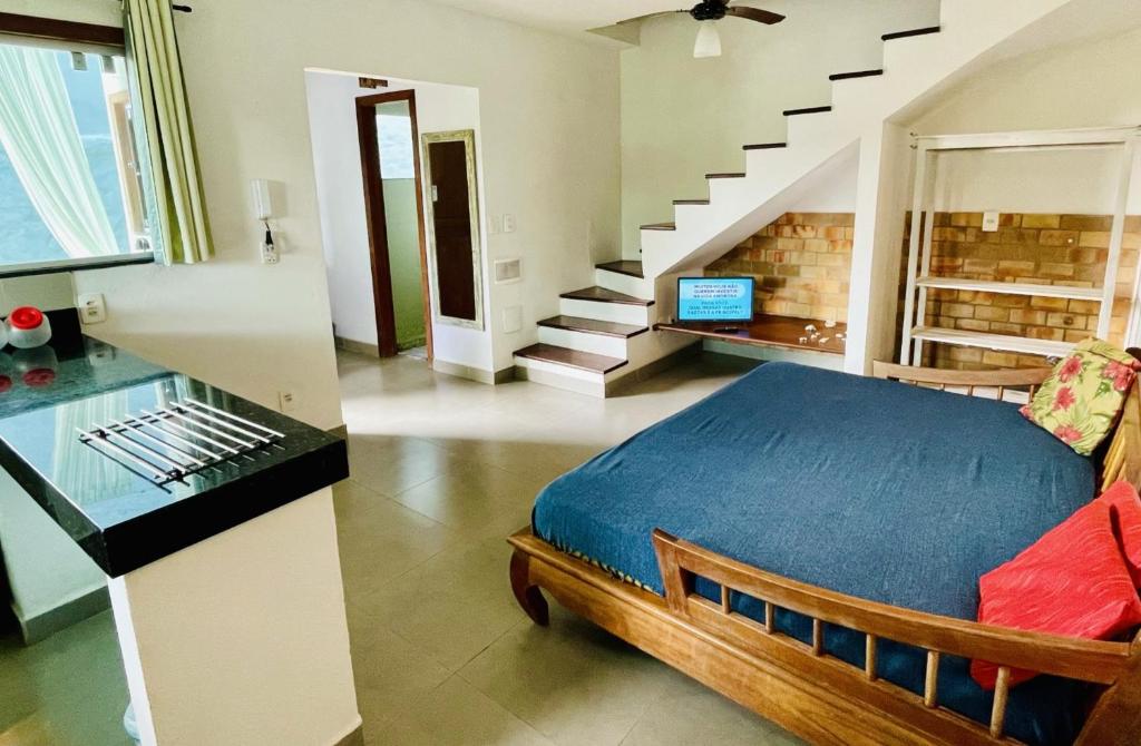 Ένα ή περισσότερα κρεβάτια σε δωμάτιο στο Casa 3 Verde, Condominio VilaZion, Arraial D'Ajuda centro