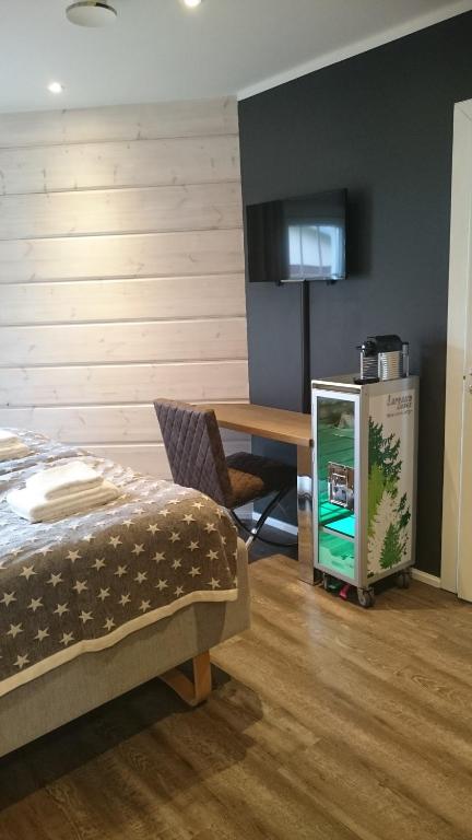 TV a/nebo společenská místnost v ubytování Lapland Lodge