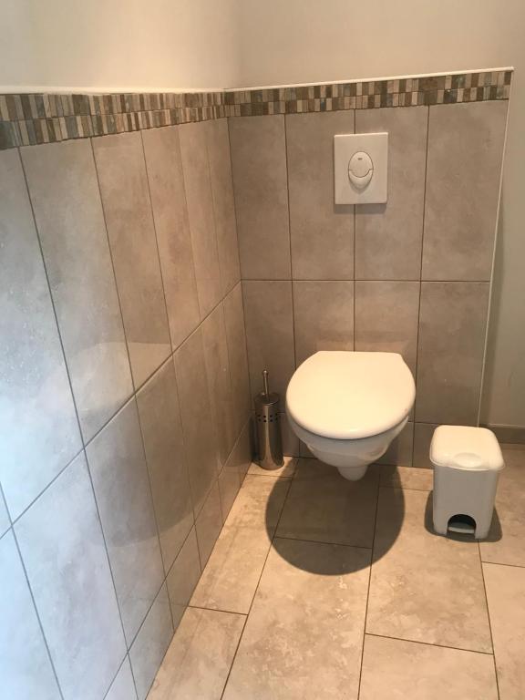 Koupelna v ubytování Gîtes Le Mas du Vieux Chêne