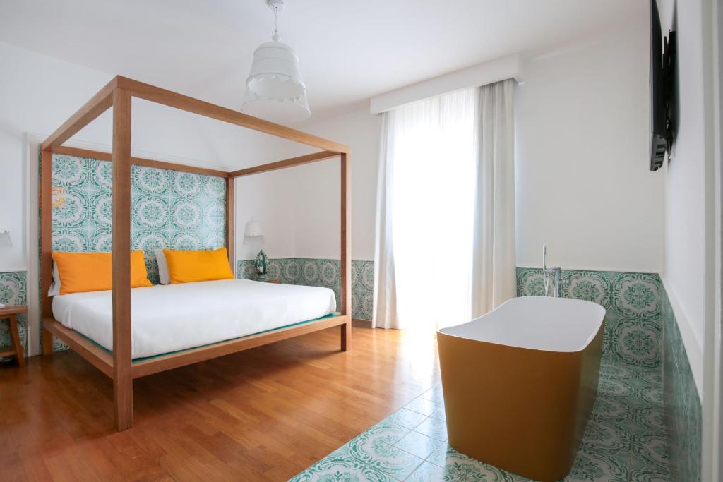 Postel nebo postele na pokoji v ubytování Maison Kalea