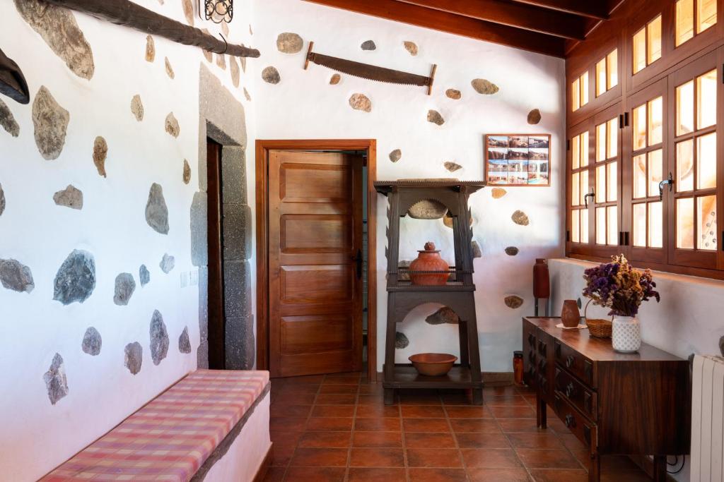 A bed or beds in a room at Casa Rural Tinamar
