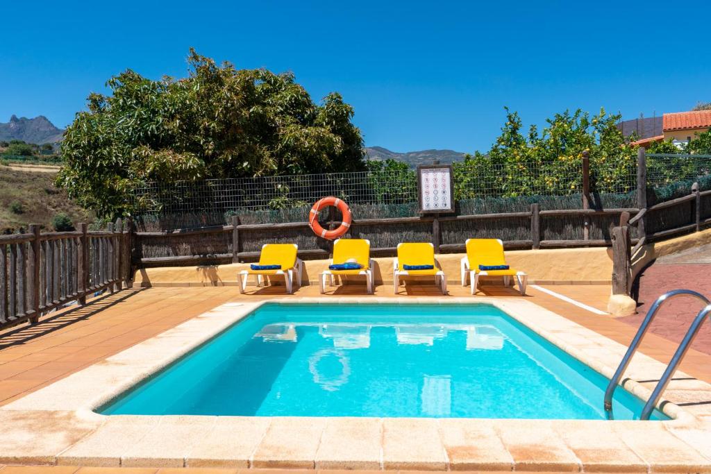 The swimming pool at or close to Casa Rural Tinamar