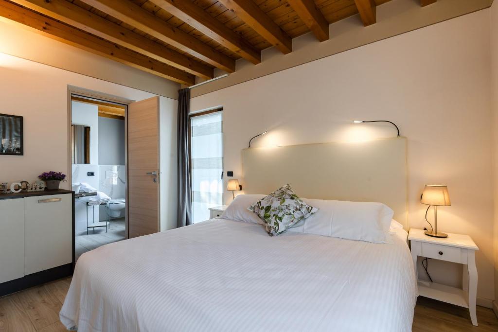 Posteľ alebo postele v izbe v ubytovaní Charming Sirmione