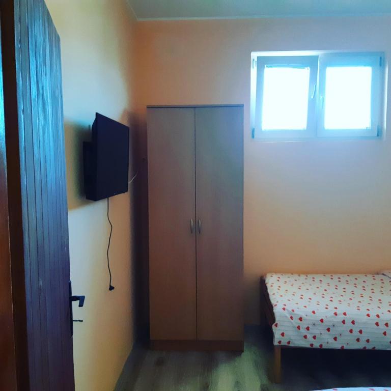 Postel nebo postele na pokoji v ubytování VILANATALIJA PANSION, APATIN